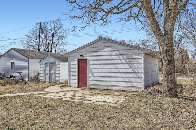 view of shed with fence