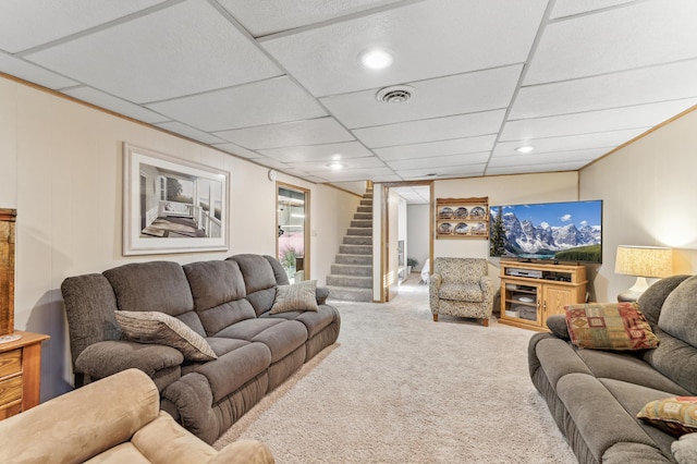 living area featuring recessed lighting, carpet floors, visible vents, and stairs