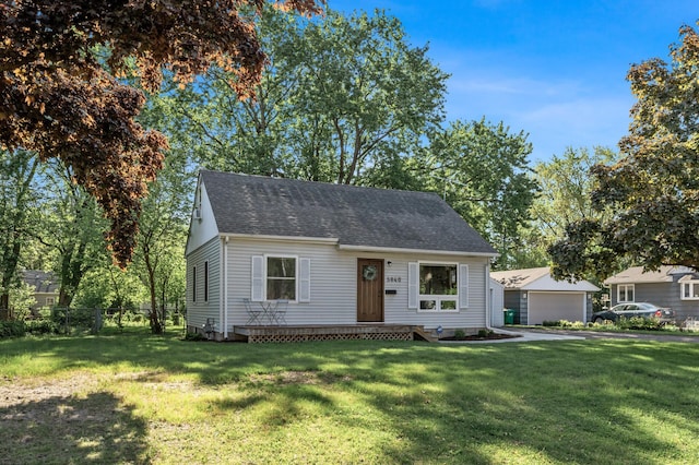 5840 Nevada Ave N, Crystal, MN 55428 - cape cod-style house featuring roof with shingles