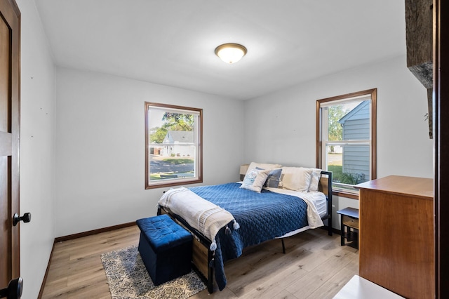 5840 Nevada Ave N, Crystal, MN 55428 - bedroom featuring light wood finished floors and baseboards