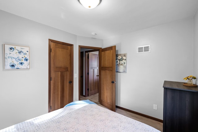5840 Nevada Ave N, Crystal, MN 55428 - bedroom with baseboards and wood finished floors