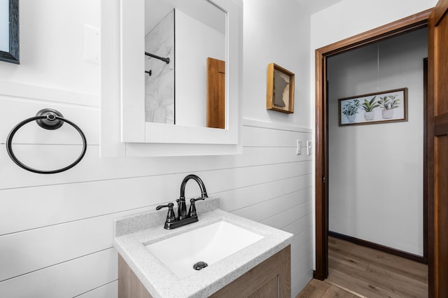 5840 Nevada Ave N, Crystal, MN 55428 - bathroom with vanity and wood finished floors