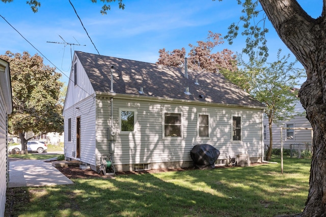 5840 Nevada Ave N, Crystal, MN 55428 - view of side of property with a yard and a shingled roof