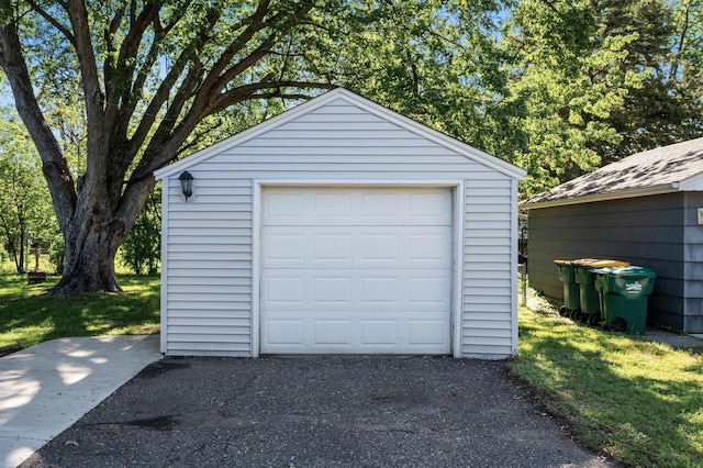 5840 Nevada Ave N, Crystal, MN 55428 - detached garage featuring asphalt driveway