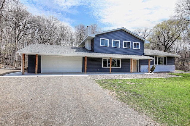 25755 E Comfort Dr, Wyoming, MN 55013 - traditional-style home featuring driveway, a chimney, covered porch, an attached garage, and a front yard