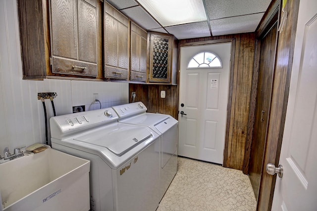 25755 E Comfort Dr, Wyoming, MN 55013 - laundry area featuring separate washer and dryer, wood walls, a sink, and cabinet space