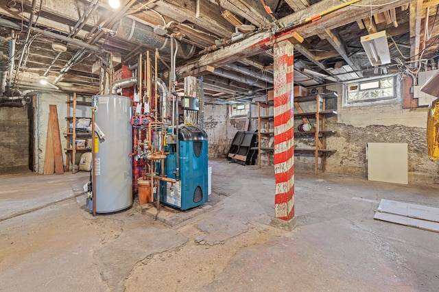 below grade area featuring a heating unit and gas water heater