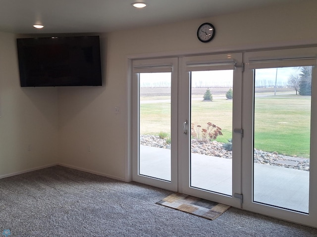409 Prairieview St, St Thomas, ND 58276 - entryway featuring baseboards, recessed lighting, and carpet