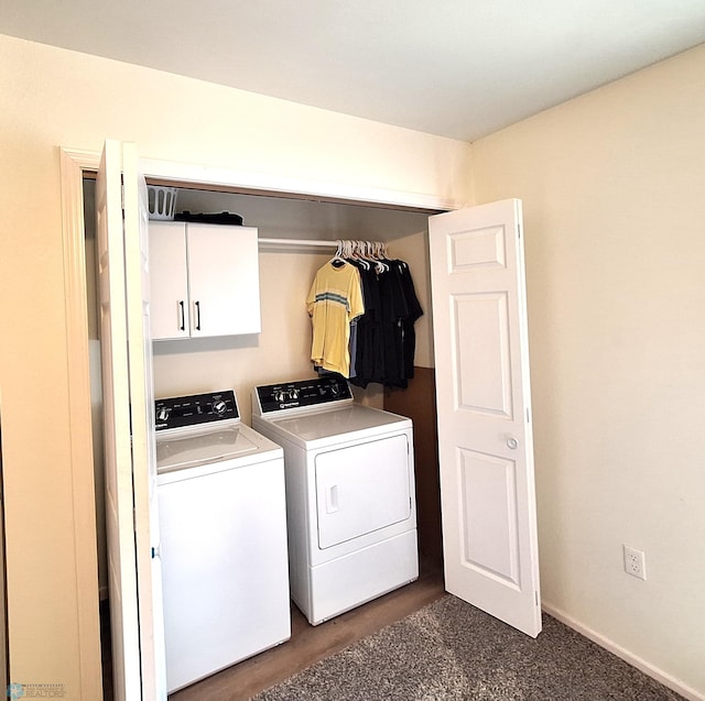 409 Prairieview St, St Thomas, ND 58276 - washroom with baseboards, dark colored carpet, cabinet space, and separate washer and dryer