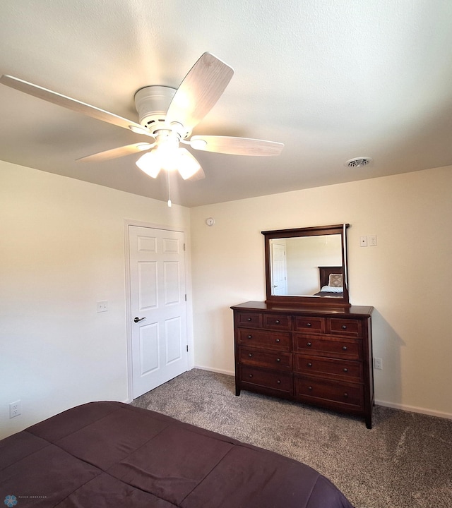 409 Prairieview St, St Thomas, ND 58276 - bedroom featuring visible vents, a ceiling fan, and carpet