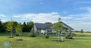 409 Prairieview St, St Thomas, ND 58276 - view of home's community with a lawn