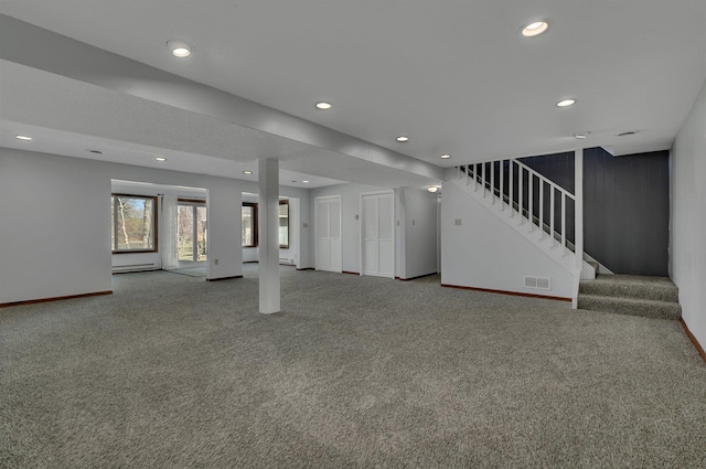 basement featuring recessed lighting, stairs, carpet floors, and baseboards