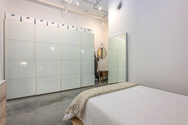 250 Park Ave Unit 601, Minneapolis, MN 55415 - bedroom with concrete flooring