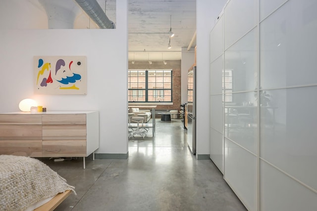 250 Park Ave Unit 601, Minneapolis, MN 55415 - hallway with rail lighting and concrete floors