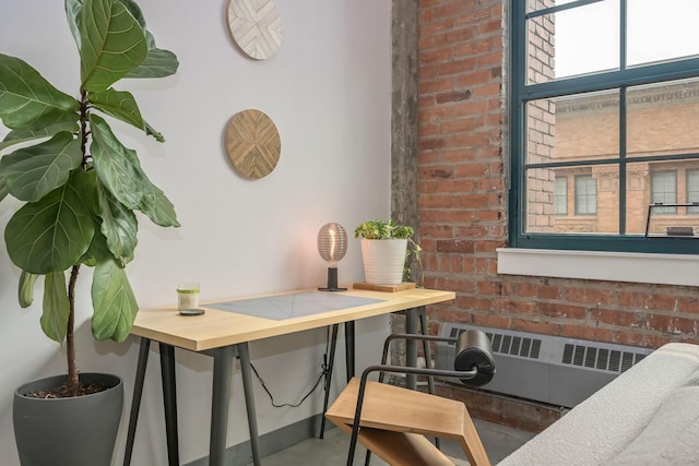 250 Park Ave Unit 601, Minneapolis, MN 55415 - detailed view of radiator and brick wall