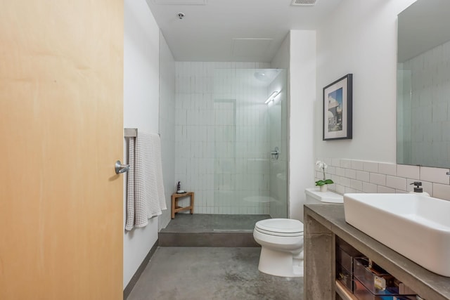 250 Park Ave Unit 601, Minneapolis, MN 55415 - full bathroom featuring vanity, a tile shower, concrete floors, and backsplash
