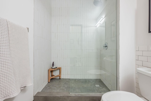 250 Park Ave Unit 601, Minneapolis, MN 55415 - bathroom with tiled shower and tile walls