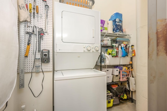 250 Park Ave Unit 601, Minneapolis, MN 55415 - laundry area with stacked washing machine and dryer