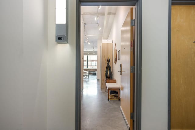 250 Park Ave Unit 601, Minneapolis, MN 55415 - hallway with finished concrete floors and track lighting