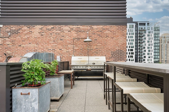 250 Park Ave Unit 601, Minneapolis, MN 55415 - view of patio / terrace featuring grilling area