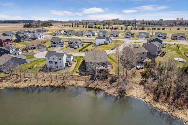 aerial view with a water view and a residential view
