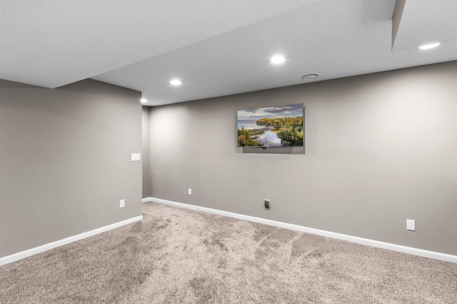 finished below grade area featuring baseboards, carpet flooring, and recessed lighting