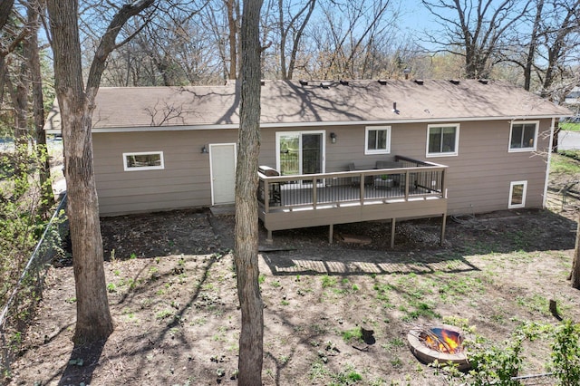 rear view of house with a deck
