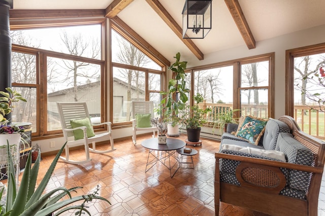 sunroom / solarium with beamed ceiling