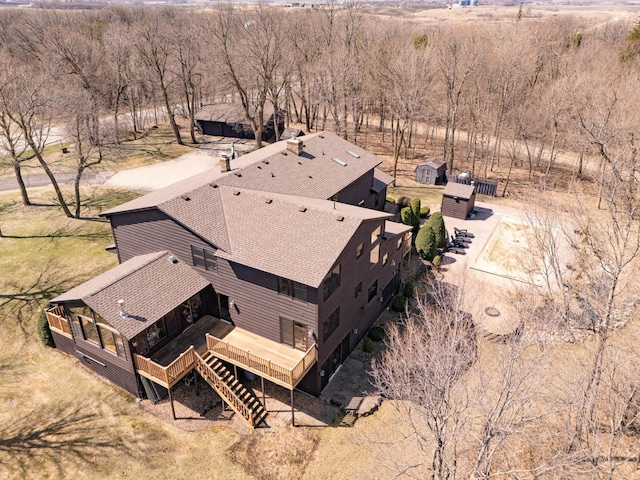 birds eye view of property featuring a rural view