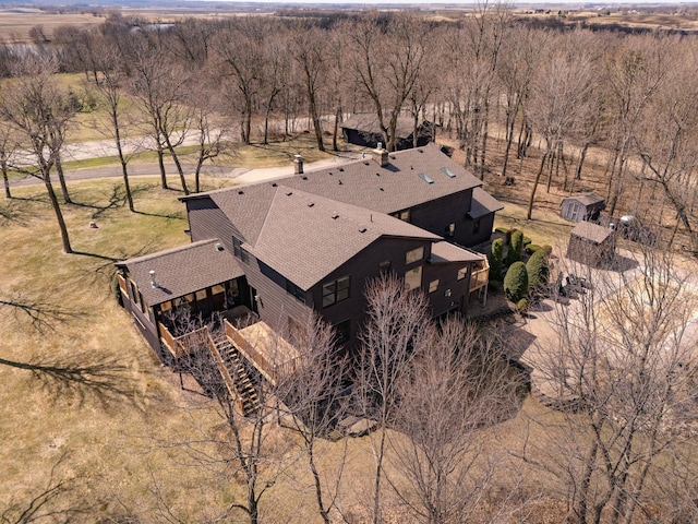 birds eye view of property with a rural view