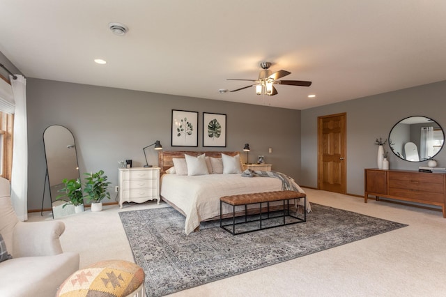 carpeted bedroom featuring recessed lighting, a ceiling fan, and baseboards
