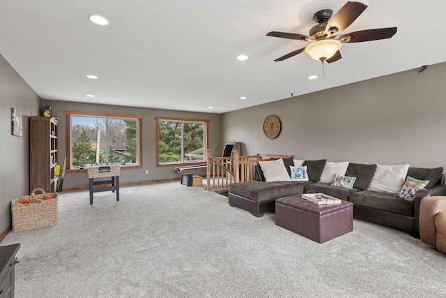 14921 Zeolite St NW, Ramsey, MN 55303 - living room featuring ceiling fan, carpet, baseboards, and recessed lighting