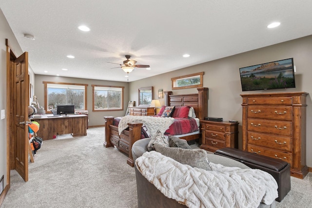 14921 Zeolite St NW, Ramsey, MN 55303 - bedroom featuring light carpet, baseboards, a ceiling fan, and recessed lighting