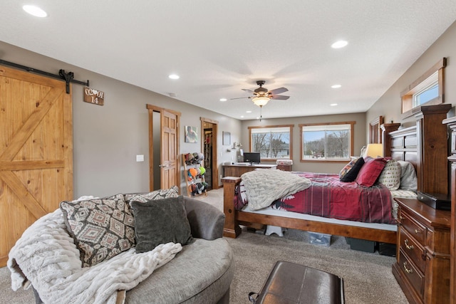 14921 Zeolite St NW, Ramsey, MN 55303 - bedroom featuring a barn door, carpet floors, multiple windows, and recessed lighting