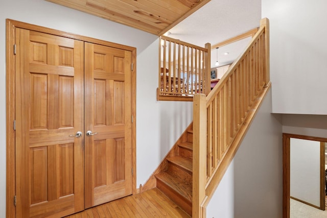 14921 Zeolite St NW, Ramsey, MN 55303 - stairs featuring wood-type flooring