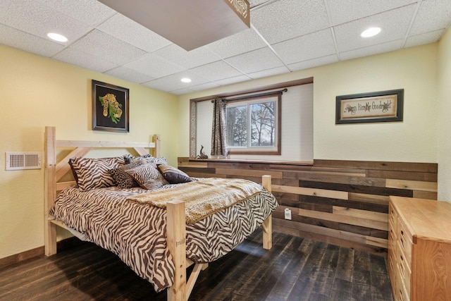 14921 Zeolite St NW, Ramsey, MN 55303 - bedroom with wood finished floors, a paneled ceiling, visible vents, baseboards, and recessed lighting