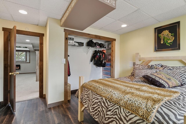 14921 Zeolite St NW, Ramsey, MN 55303 - bedroom with a paneled ceiling, a closet, recessed lighting, and dark wood-style floors