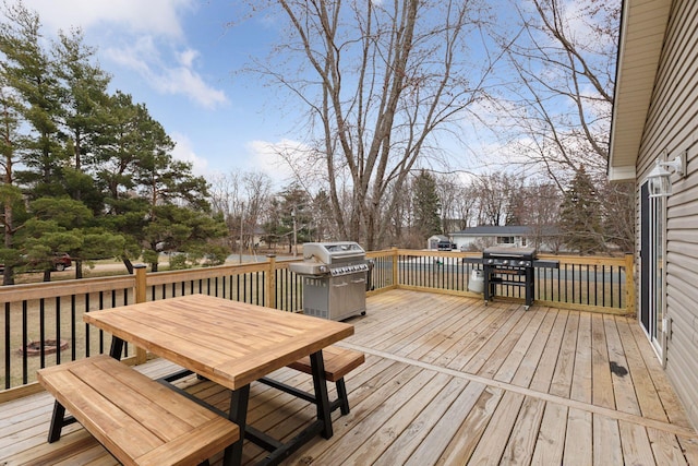 14921 Zeolite St NW, Ramsey, MN 55303 - wooden terrace with grilling area and outdoor dining space