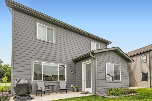 rear view of property with a patio