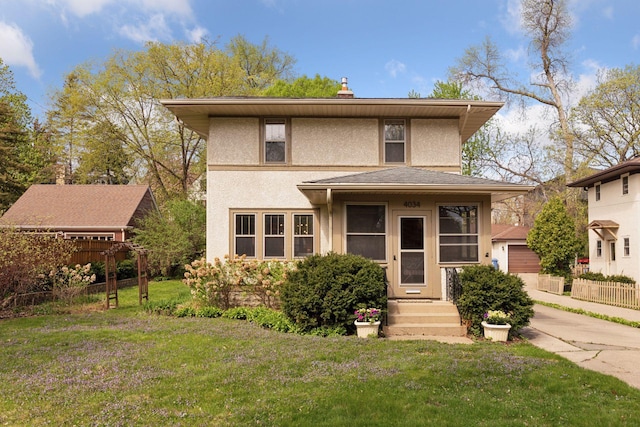 4034 Abbott Ave S, Minneapolis, MN 55410 - view of front of property with stucco siding and a chimney