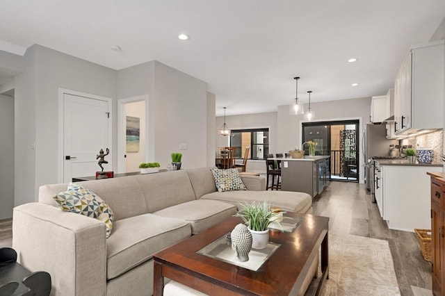 6369 16th Ave S, Richfield, MN 55423 - living area featuring wood finished floors and recessed lighting