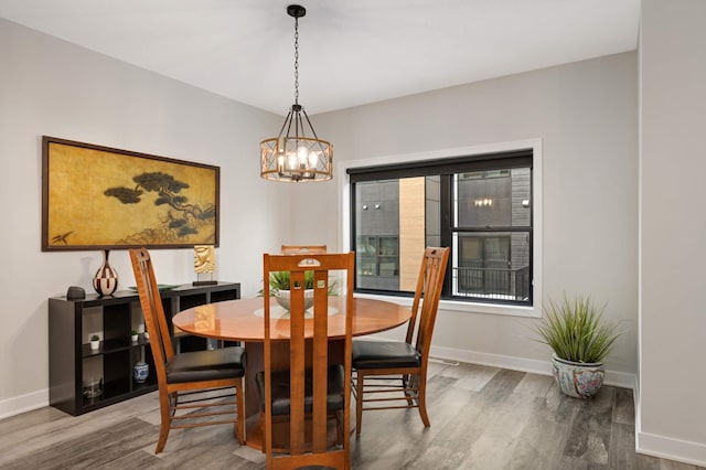 6369 16th Ave S, Richfield, MN 55423 - dining space with wood finished floors and a chandelier