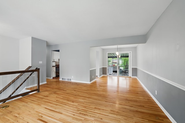 8307 Johnson Ave S, Bloomington, MN 55437 - spare room with light wood-style floors and baseboards