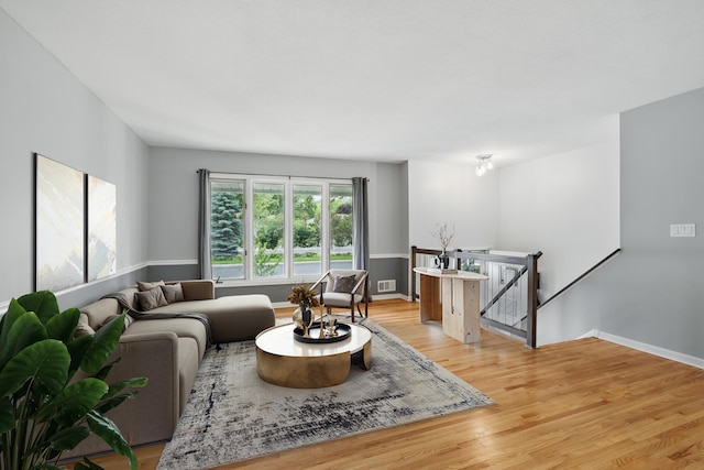8307 Johnson Ave S, Bloomington, MN 55437 - living room featuring light wood finished floors and baseboards