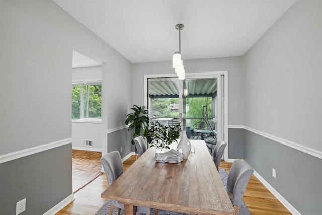 8307 Johnson Ave S, Bloomington, MN 55437 - dining area featuring light wood-style flooring