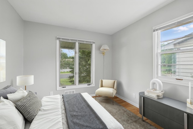 8307 Johnson Ave S, Bloomington, MN 55437 - bedroom with wood finished floors and baseboards