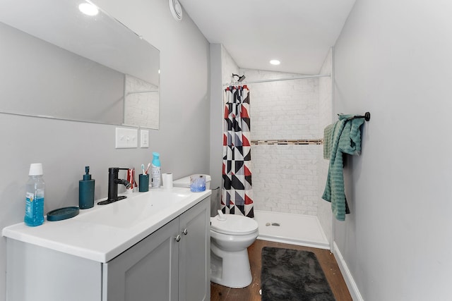 936 Westminster St, Saint Paul, MN 55130 - full bath featuring a stall shower, toilet, wood finished floors, vanity, and recessed lighting