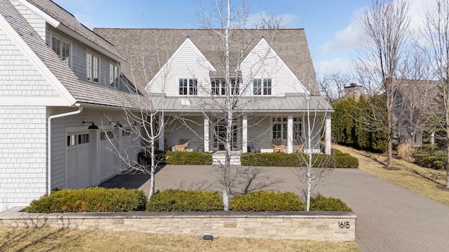 view of front of property featuring covered porch