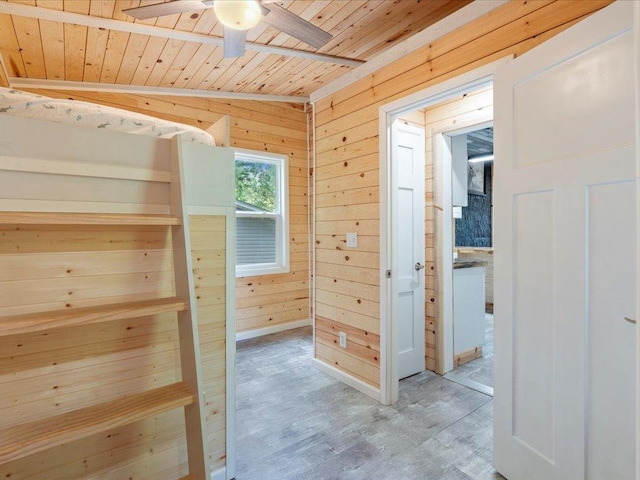6274 Azalea Rd, Motley Twp, MN 56466 - hallway featuring wooden ceiling, wooden walls, light wood-style flooring, and vaulted ceiling