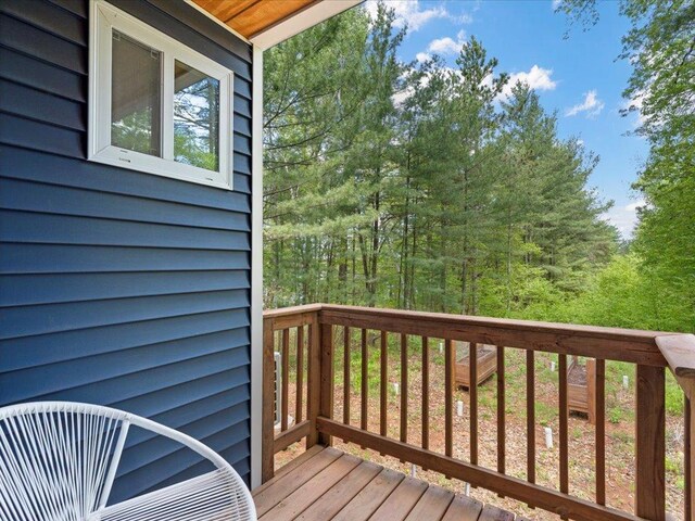 6274 Azalea Rd, Motley Twp, MN 56466 - wooden deck with a forest view